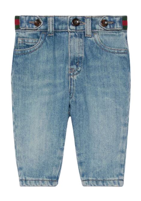 Jeans neonato in cotone denim GUCCI | 770083/CEDENIM
